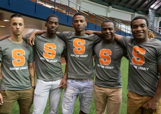Five members of the military at Syracuse football stadium.