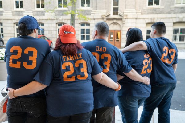 shot of family from behind with customized #23 tshirts