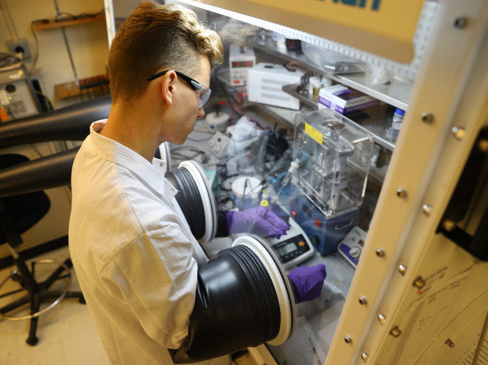 man working in lab with equipment