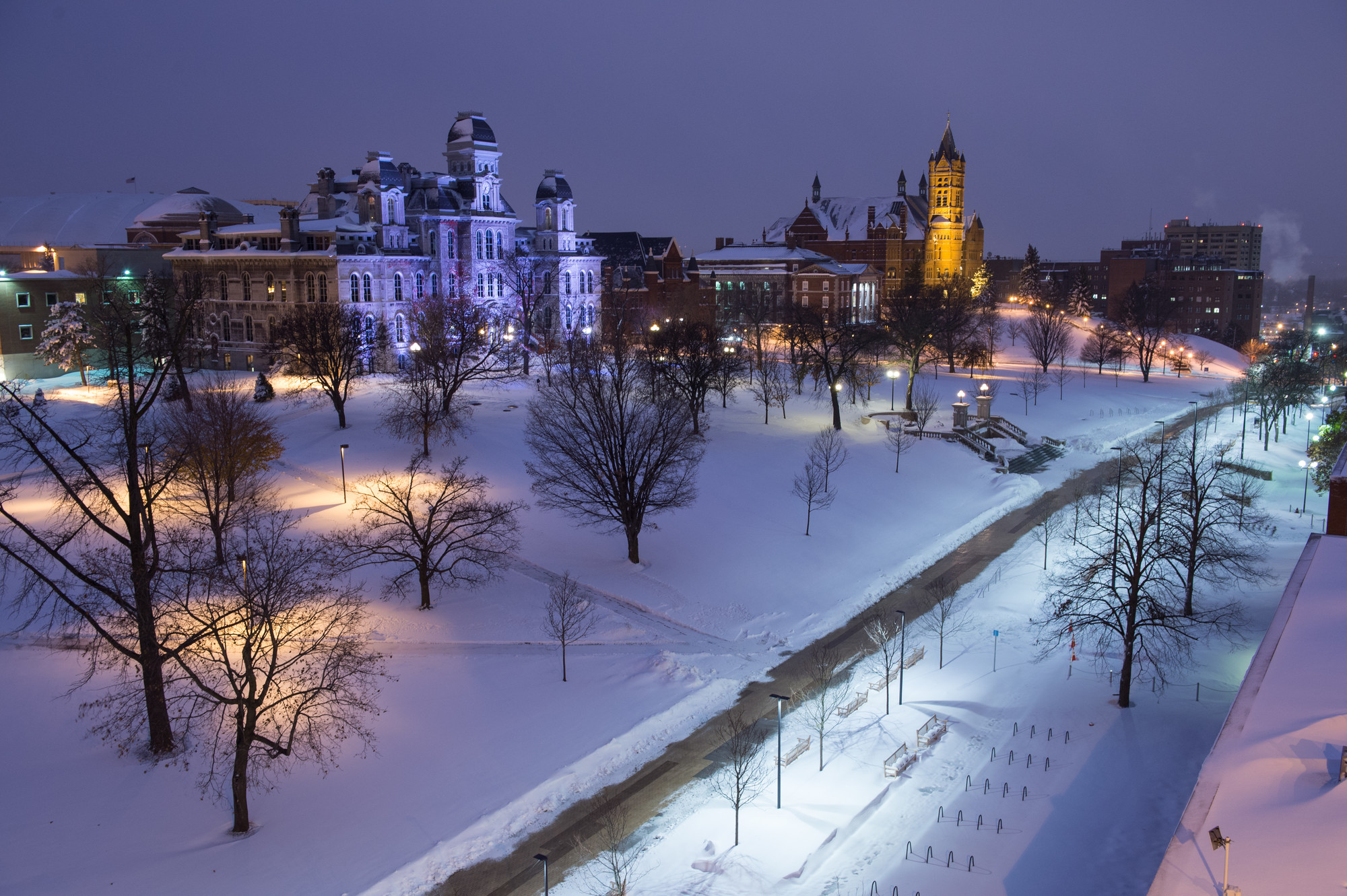 snowy nighttime campus scene