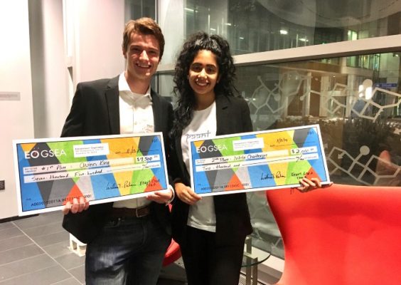 student entrepreneurs pose with contest winnings