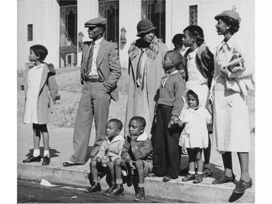archival photo of black men, women and children