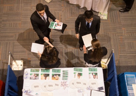 aerial view of students speaking with recruiters