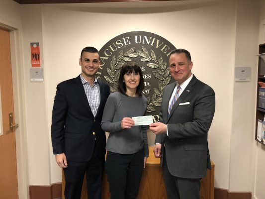 Ben Vasquez and his mother standing with dean of University College