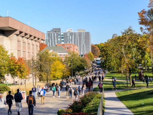people walking on campus