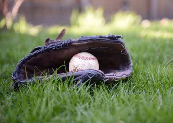 stock image of baseball mitt and ball