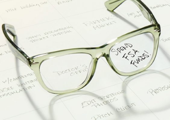 stock image of glasses on a calendar with Spend FSA Funds as an entry