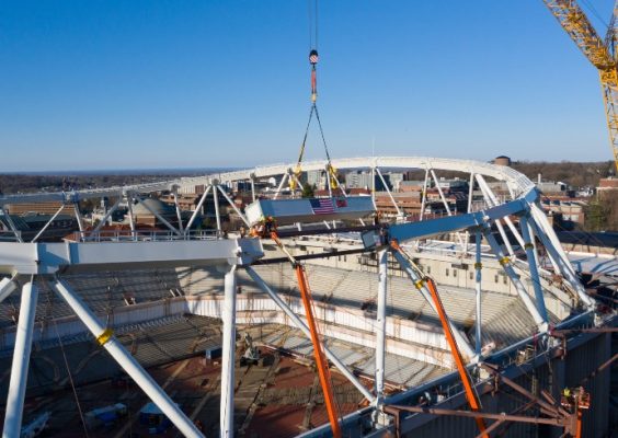 final beam being placed in crown-truss for stadium replacement roof