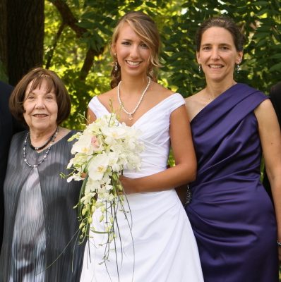 three women standing outside