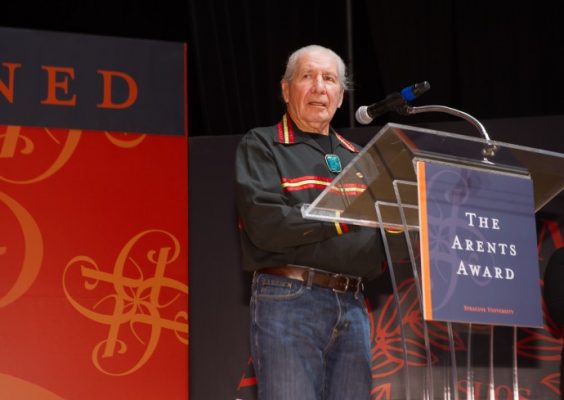 Oren Lyons speaks from a podium at the Arents Award