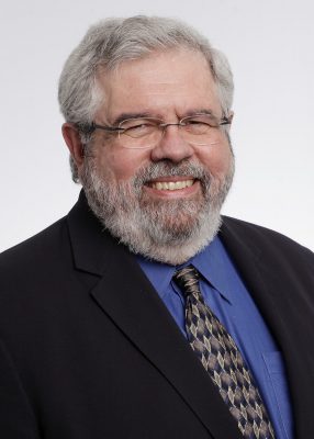 professional headshot of David Cay Johnston, distinguished visiting lecturer in the College of Law