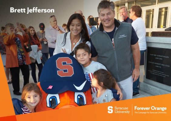 three children and two adults standing next to Otto