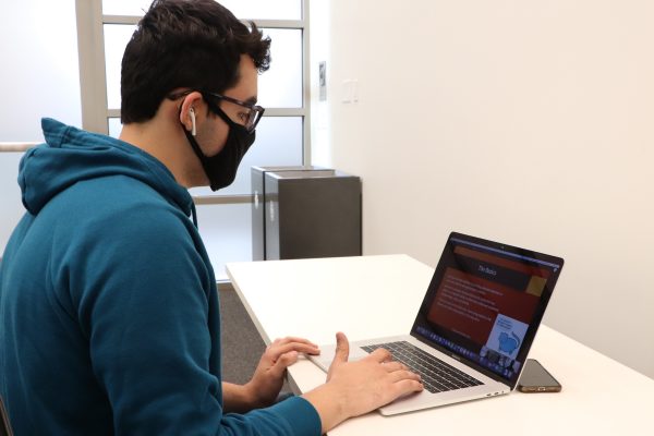 person sitting in front of computer
