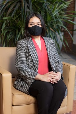 person sitting in mask