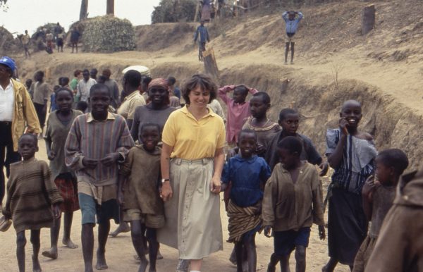 Professor Catherine Bertini with children in Rwanda in 1994