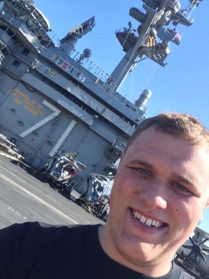 Dustin Hall in front of F-35 carrier