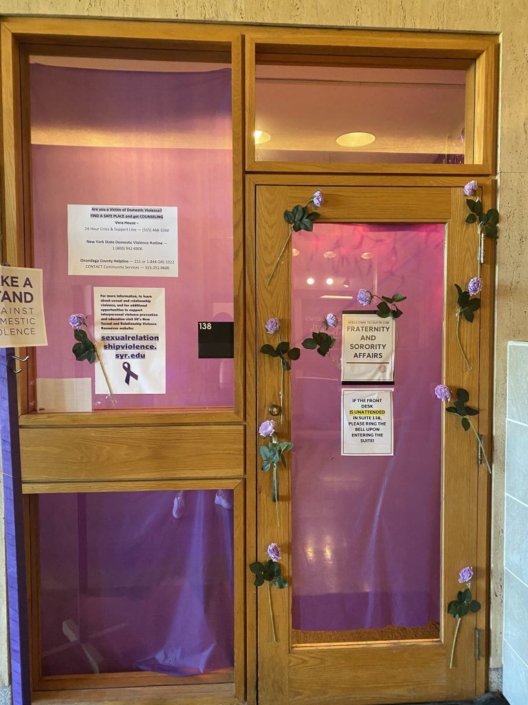 office entrance covered in purple decorations