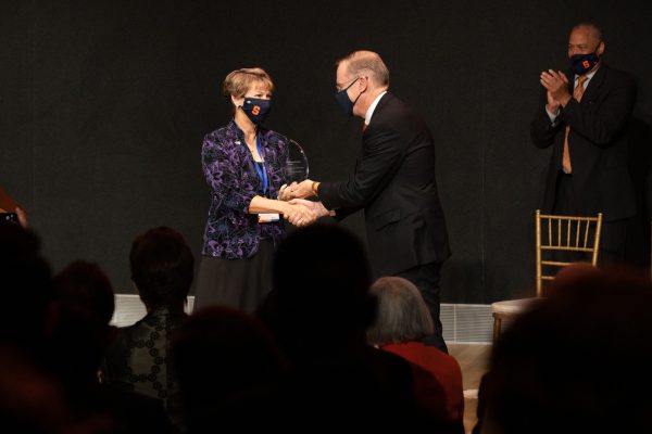 Chancellor Syverud presents the Military-Veteran Alumni Award to Eileen Collins