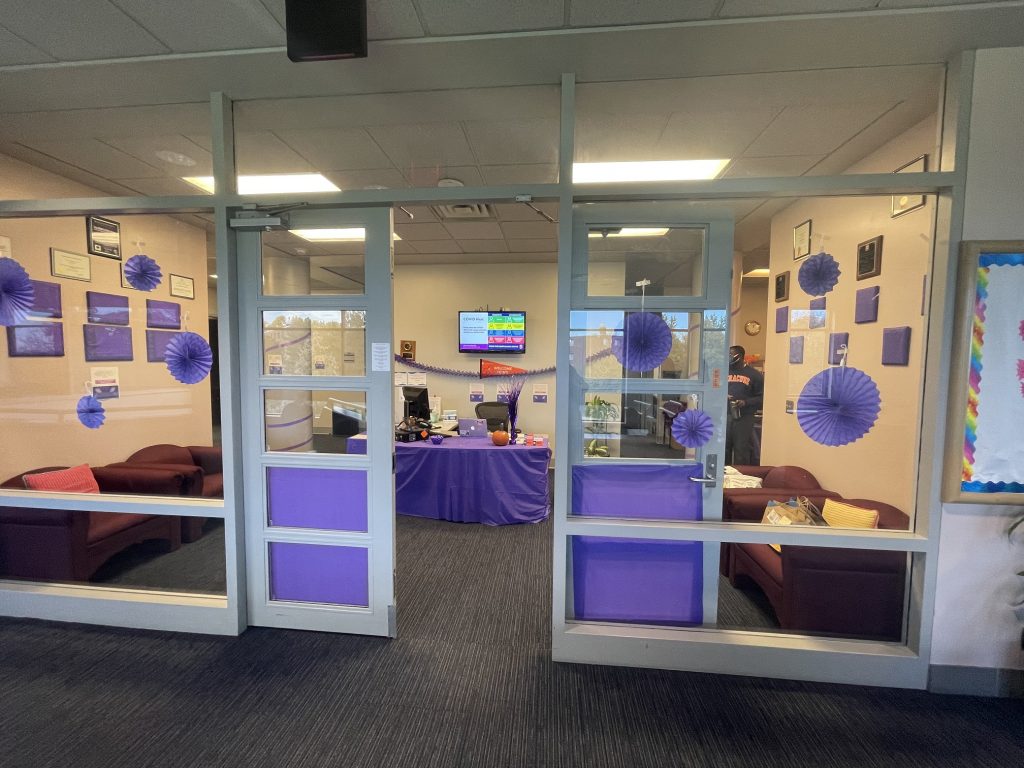 open glass doors with purple decorations