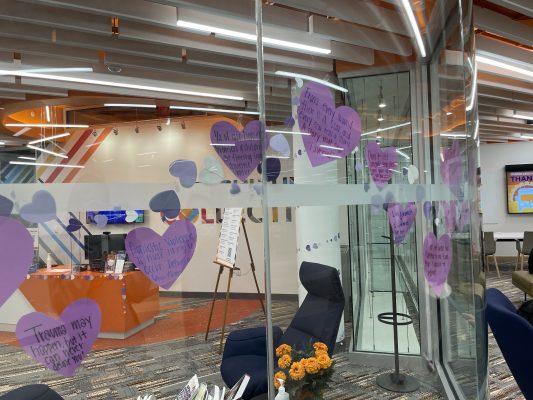 wall of glass with purple hearts