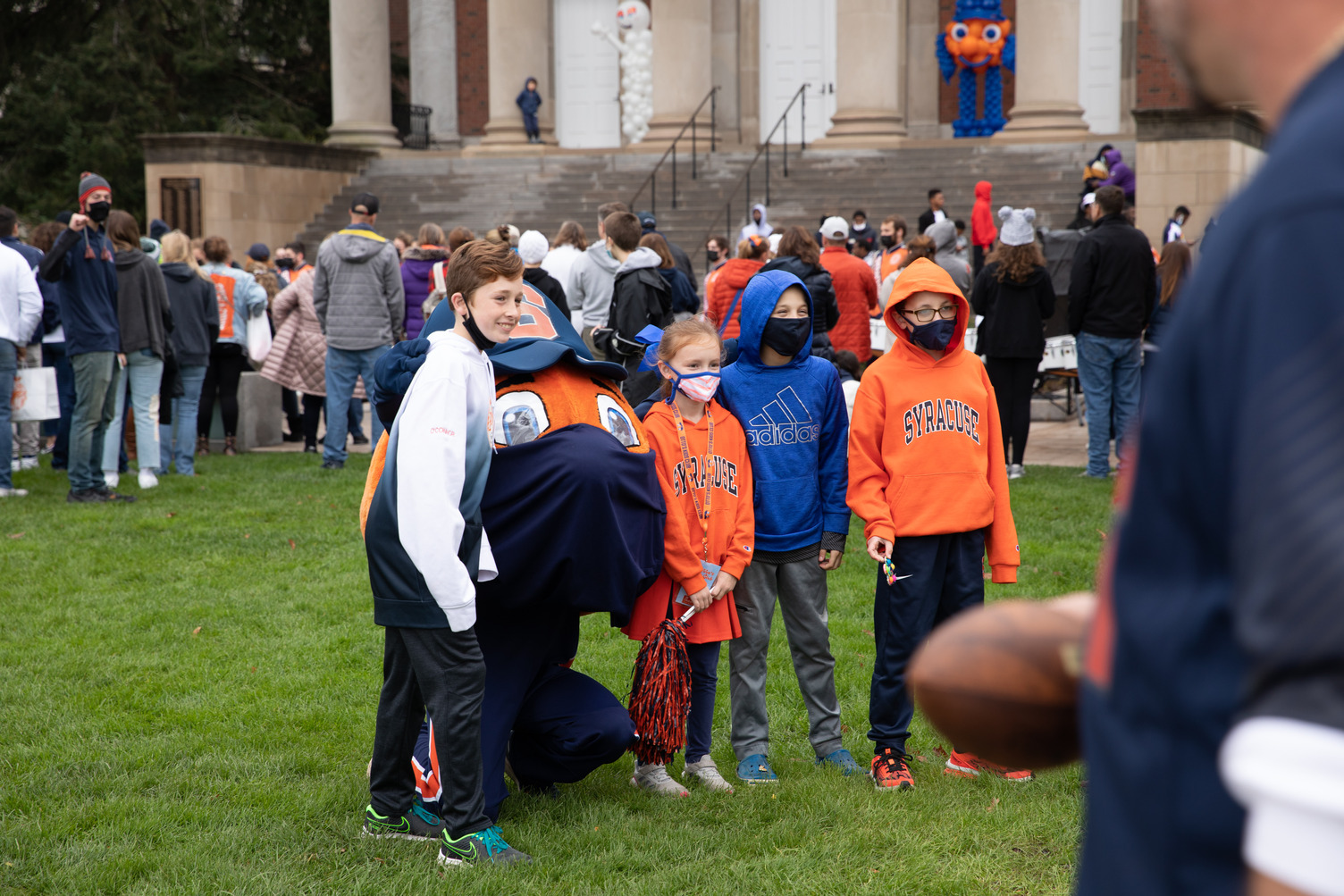 children are photographed with Otto during Orange Central