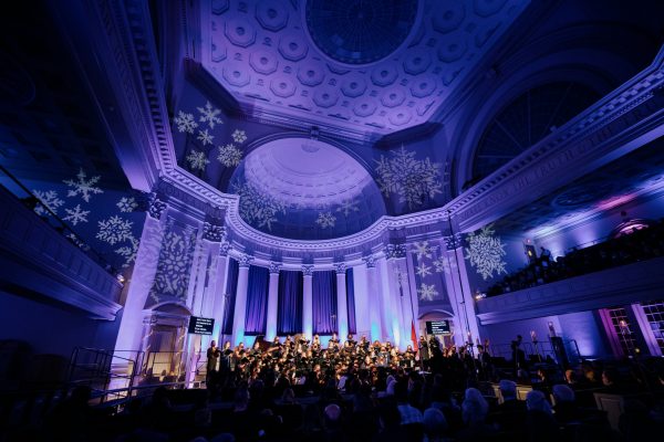 singers inside Hendricks Chapel