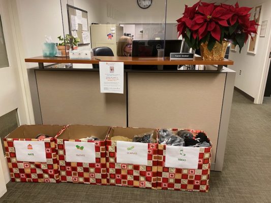 Boxes of donated items in the School of Social Work at Falk College.