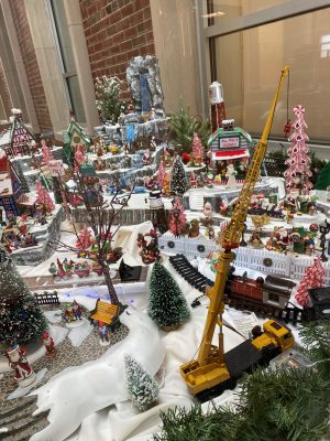 Christmas village with miniature buidings and figures