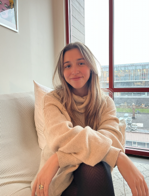 person sitting on couch in room