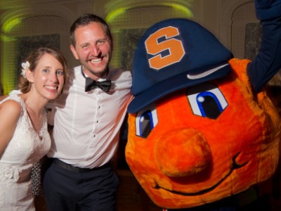 Erica Blust and Shawn Rommevaux pose with Otto during their wedding in 2015.
