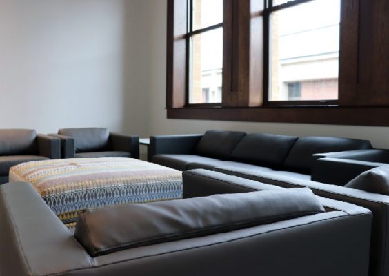 couches and windows abound in a group therapy space at the Barnes Center at The Arch