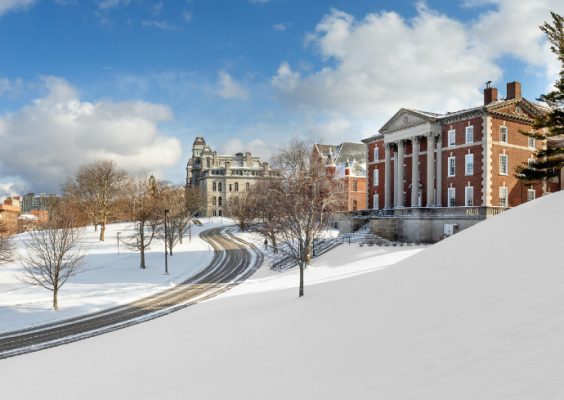 campus buildings and grounds covered in snow