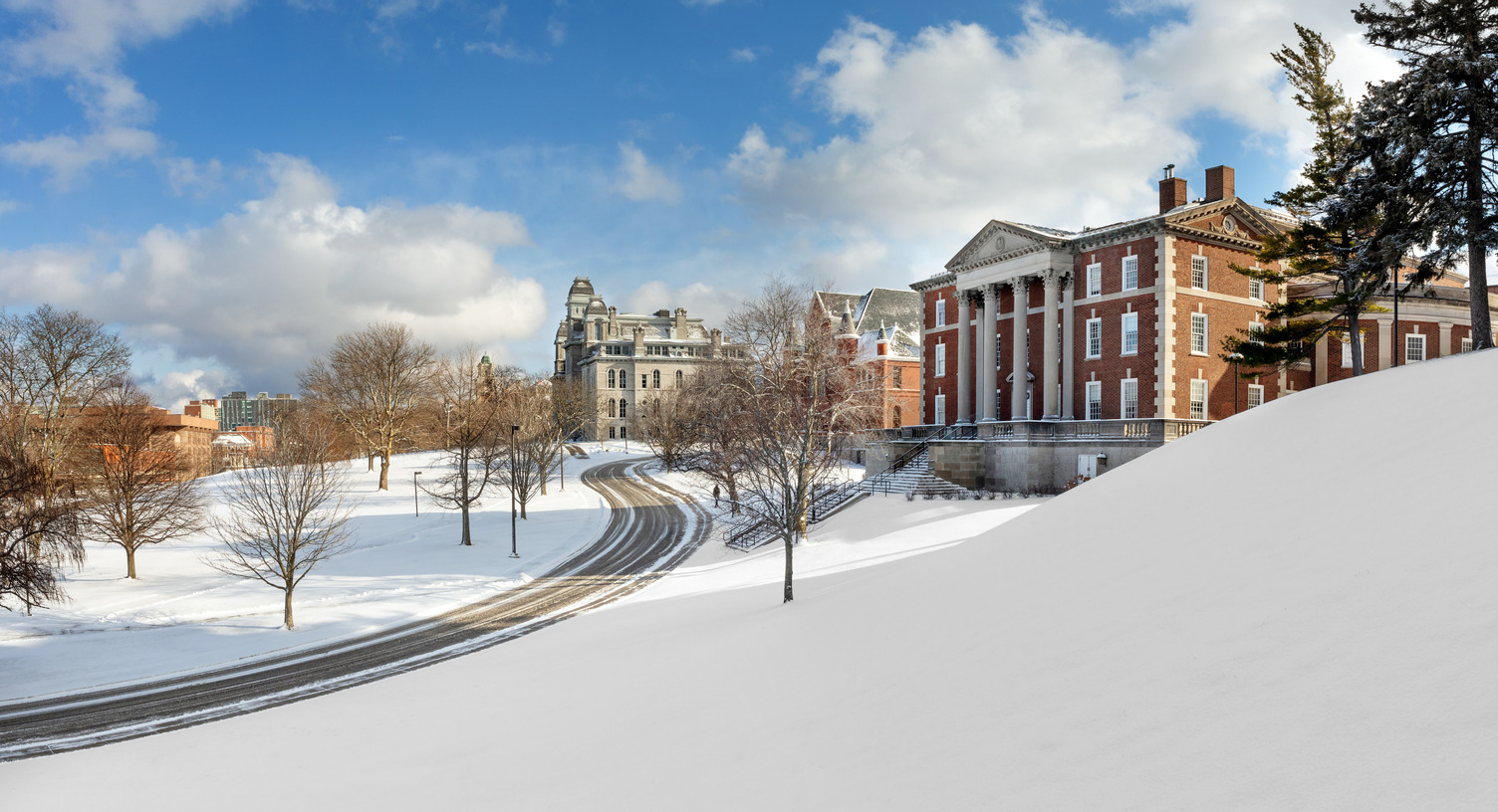 campus buildings and grounds covered in snow