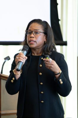 Gisele Marcus '89 delivering a keynote address during the Social Differences, Social Justice 