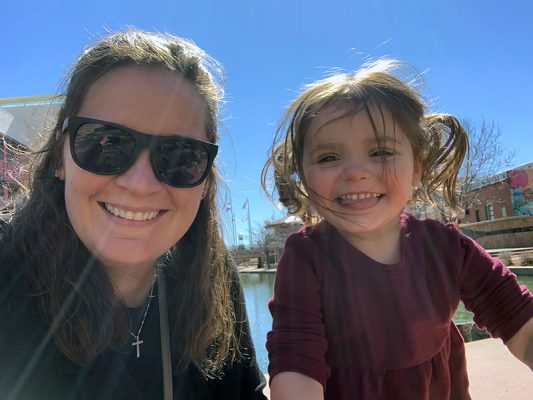 Courtney Albiker with her daughter Addison on a sunny day