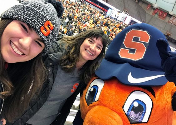 Courtnie and Kerri Lewis take a selfie with Otto in the stadium