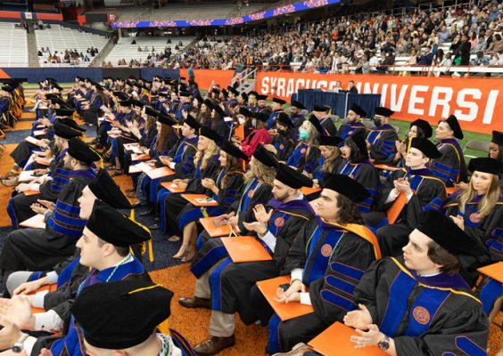 law students seated in the stadium during the college's Commencement ceremony