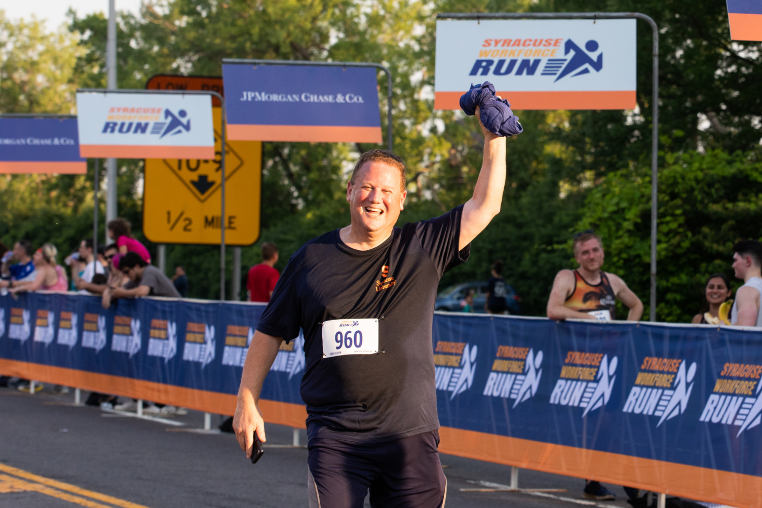 Chris Ellison gives a fist pump on the course at the Syracuse Workforce Run