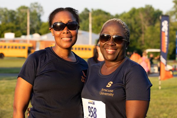 Raquel Patterson and Denise Dyce pose together at the Syracuse Workforce Run