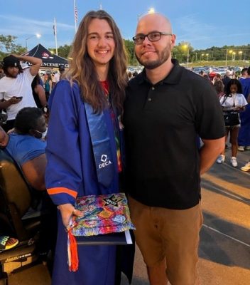 Jim Powers and John Holohan pose together at John's high school graduation