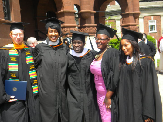 group of people wearing graduation robes