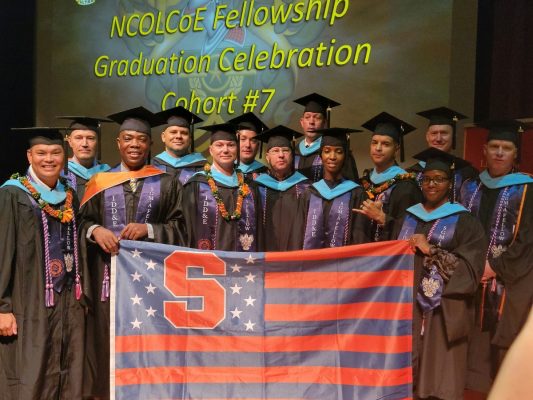group of students who graduated from the Syracuse University School of Education's IDD&E program at Fort Bliss, Texas