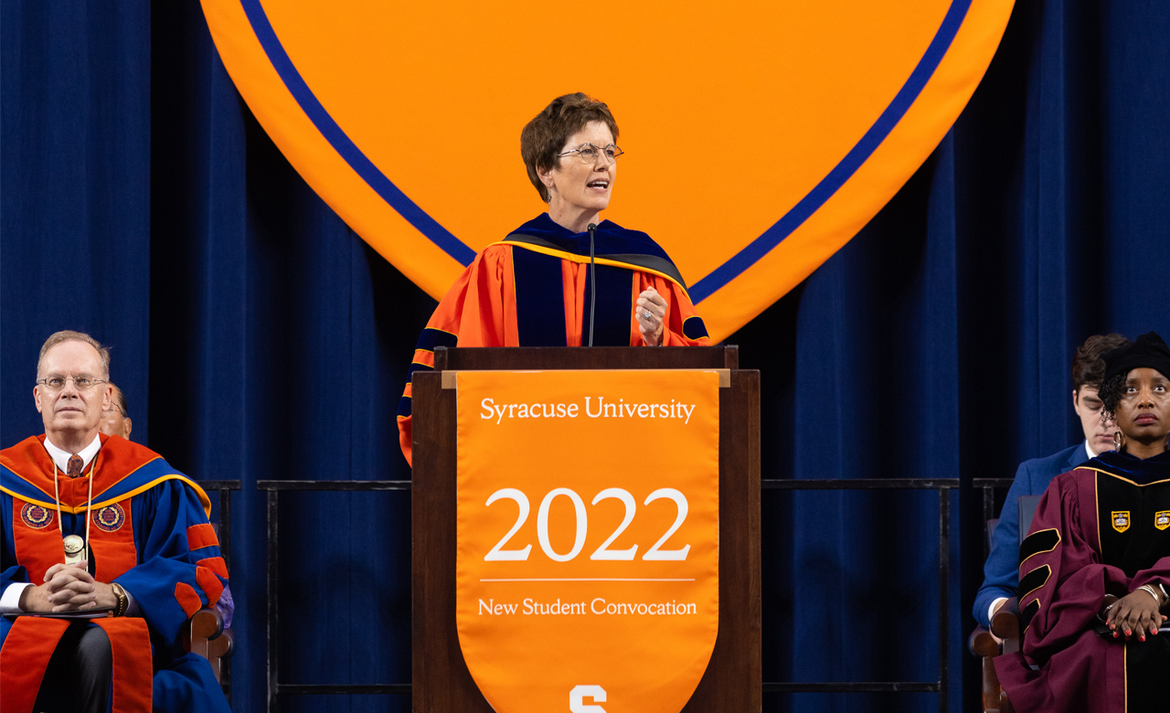 Provost Gretchen Ritter addresses students from the podium at 2022 New Student Convocation