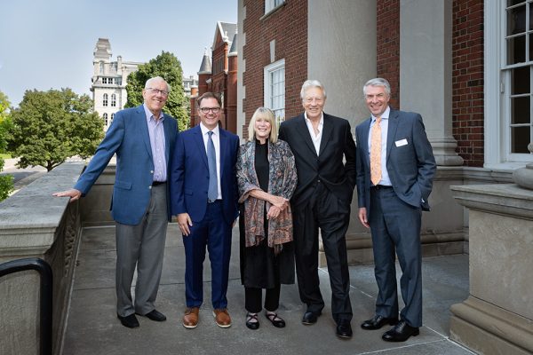 Jim Boeheim, Chris Faricy, Kathy Hicker, George Hicker and Dean David Van Slyke pose together during panel discussion at Maxwell School