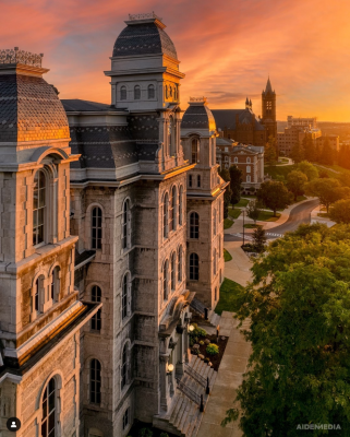 a stunning view of Syracuse University's campus at sunset