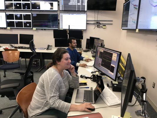 two people working at computers