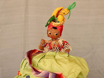 doll wearing yellow dress