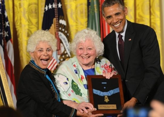 Ina Shemin Bass and Elsie Shemin Roth, the daughters of William Shemin '1924, receive the Medal of Honor from President Barack Obama on their father's behalf in 2015