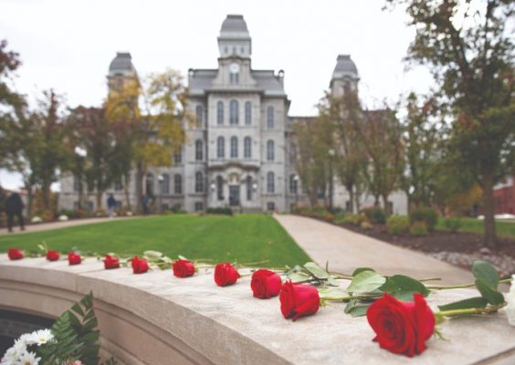 Remembrance Wall with roses and Hall of Languages