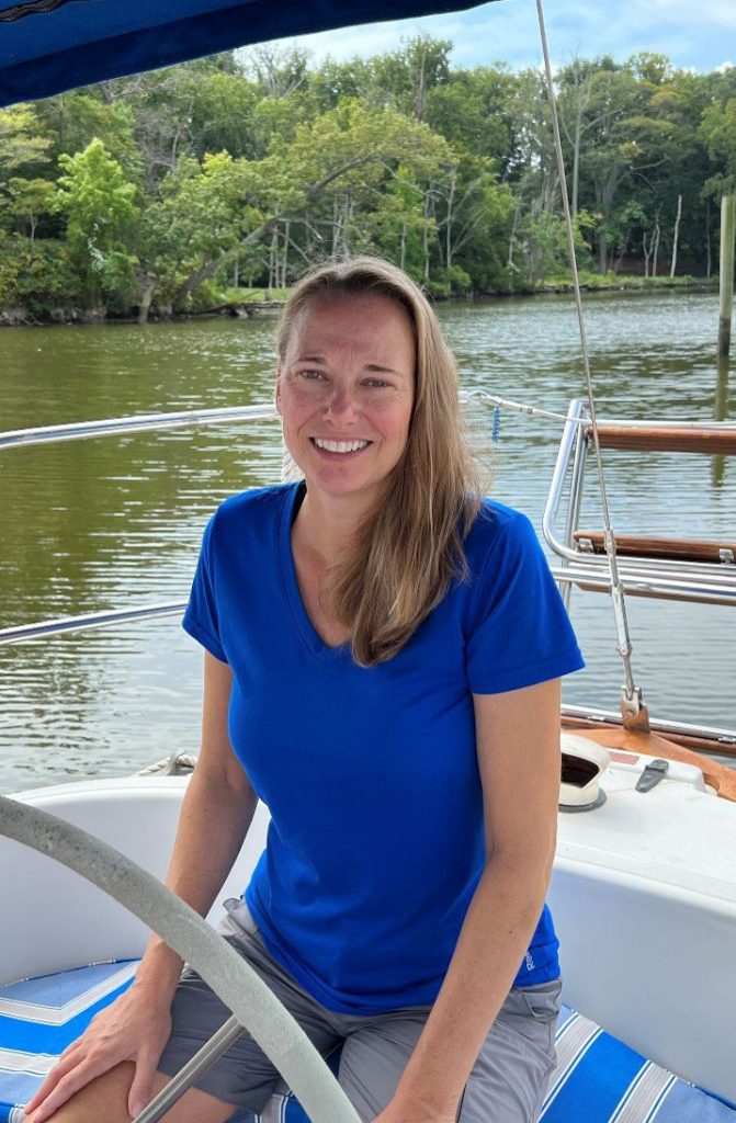 Kari Segraves sitting in a boat
